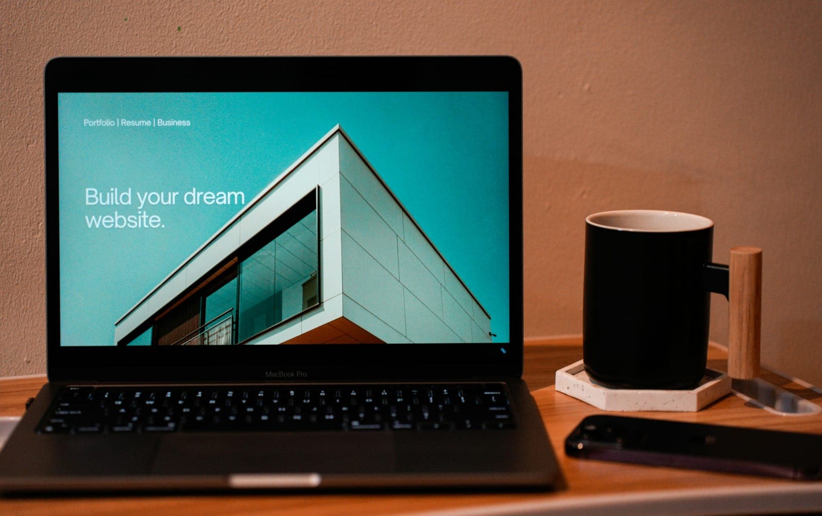 Construction company website design displayed on a laptop